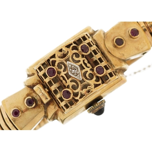 2147 - Ladies 9ct gold bracelet wristwatch set with a diamond, rubies and sapphire crown, the case 16mm wid... 