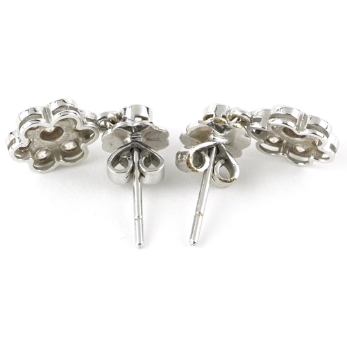 2007 - Pair of unmarked white gold diamond flower head drop earrings, each diamond approximately 2.20mm in ... 