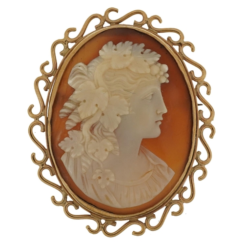 2102 - Unmarked gold cameo shell brooch carved with a maiden, tests as 9ct gold, 5cm high, 10.2g