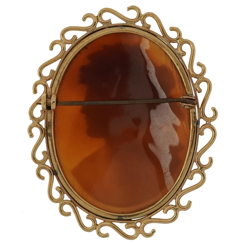 2102 - Unmarked gold cameo shell brooch carved with a maiden, tests as 9ct gold, 5cm high, 10.2g