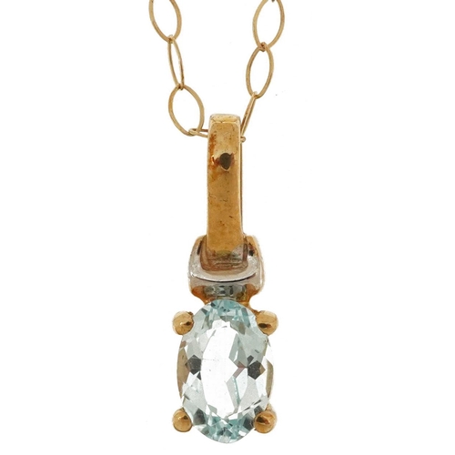 2798 - 9ct gold blue topaz solitaire pendant on a 9ct gold necklace, 1.4cm high and 44cm in length, 1.0g