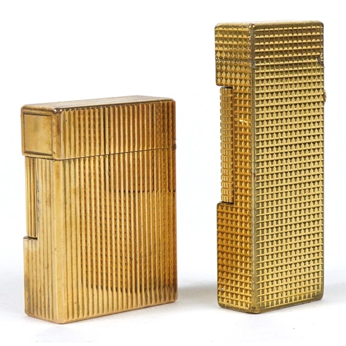 44 - Two gold plated pocket lighters comprising S J Dupont with box and Dunhill