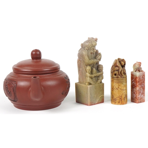 1267 - Three Chinese carved soapstone seals and a Yixing terracotta teapot with calligraphy, the largest 18... 