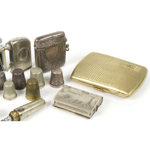 105 - Sundry items including floral engraved silver vesta, silver thimbles, Art Deco Ronson enamelled ligh... 