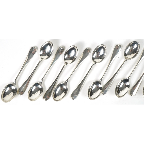 1168 - William Hutton & Sons Ltd, set of twelve George V silver teaspoons with matching sugar tongs housed ... 