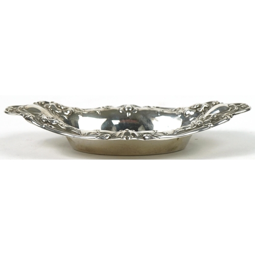 1105 - American sterling silver oval bonbon dish embossed with flowers and foliage, numbered 500A, 13.5cm w... 