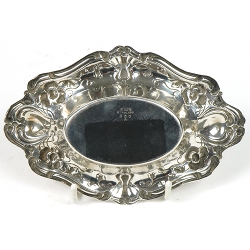 1105 - American sterling silver oval bonbon dish embossed with flowers and foliage, numbered 500A, 13.5cm w... 