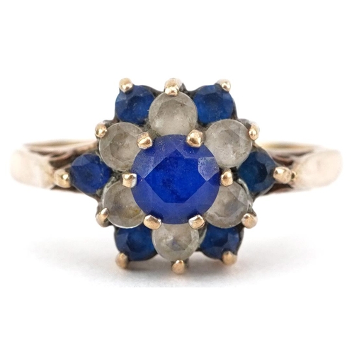 2777 - 9ct gold blue and white spinel three tier flower head ring, size K, 2.2g