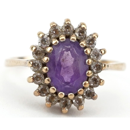 2103 - 9ct gold amethyst and cubic zirconia cluster ring, size M, 2.8g