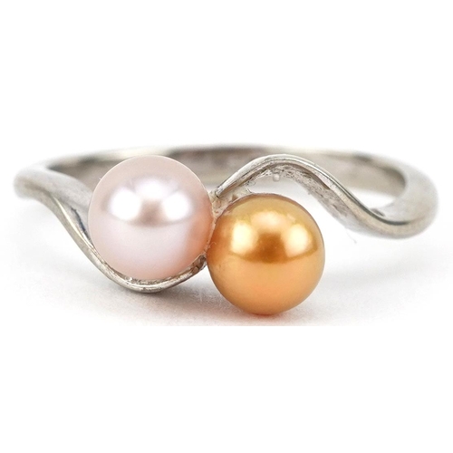 2740 - 9ct white gold cultured pearl crossover ring, size J/K, 1.9g