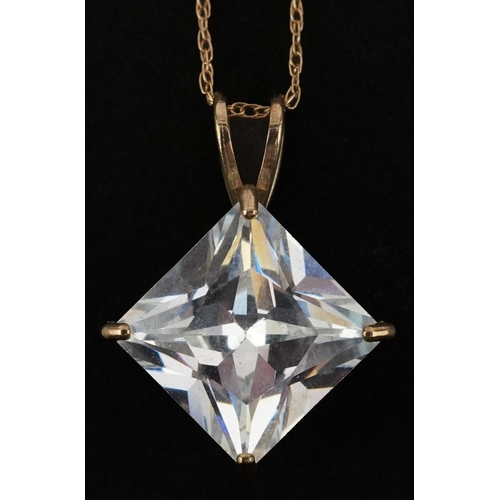 2187 - Unmarked gold clear stone pendant on a 9ct gold necklace, 1.8cm high and 38cm in length, 1.9g