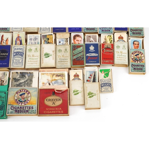 1499 - Large collection of cigarette cards, some arranged in albums, including motor cars and international... 