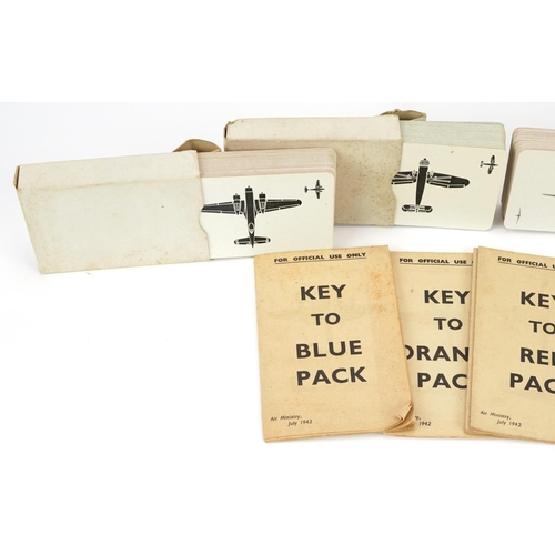 1259A - Four packs of military interest playing cards including Key to Blue pack and Key to Green pack