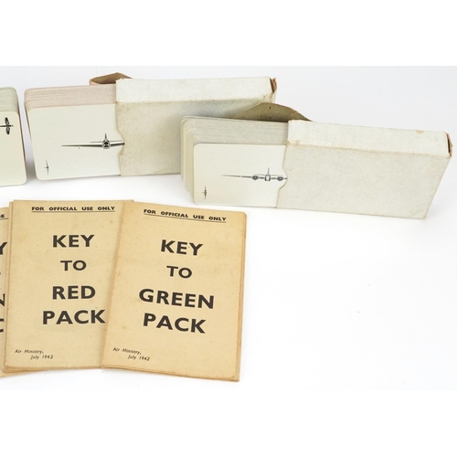 1259A - Four packs of military interest playing cards including Key to Blue pack and Key to Green pack