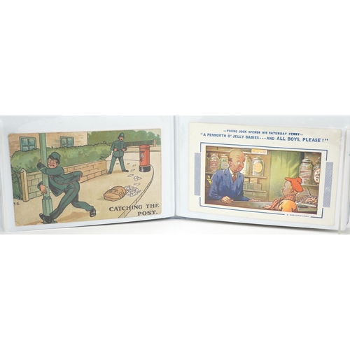 1445 - Early 20th century and later comical postcards arranged in an album including Donald McGill examples