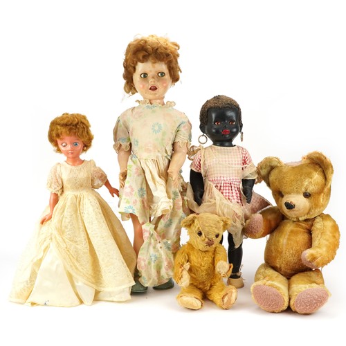 1393 - Three vintage dolls including a 28 inch Pedigree example and two golden teddy bears with jointed lim... 