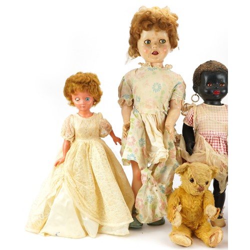 1393 - Three vintage dolls including a 28 inch Pedigree example and two golden teddy bears with jointed lim... 