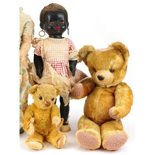 1393 - Three vintage dolls including a 28 inch Pedigree example and two golden teddy bears with jointed lim... 