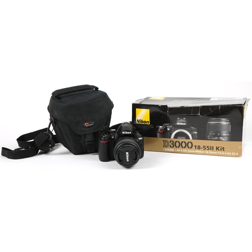 1326 - Nikon D3000 camera with accessories and box