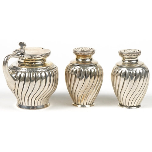 64 - Walter & John Barnard, Victorian silver three piece fluted cruet set, London 1891, the largest 6.5cm... 