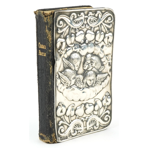 295 - James Deakin & Sons, Edwardian silver mounted Book of Common Prayer impressed with Putti and stylise... 