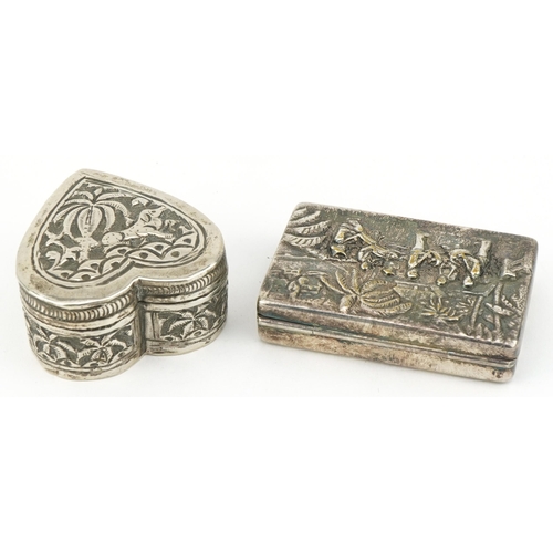 151 - Rectangular white metal snuff box, the hinged lid embossed with an African band, impressed Denmark t... 