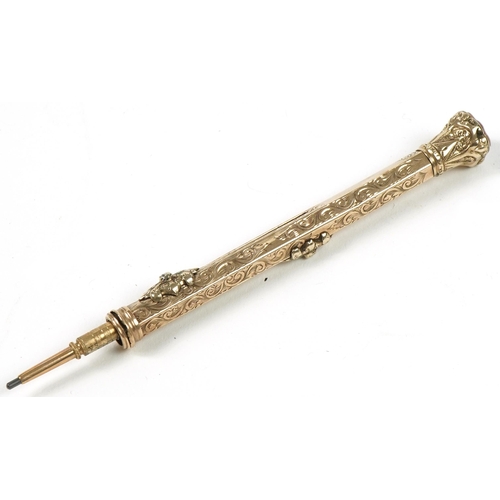 180 - Victorian unmarked gold combination propelling pencil and dip pen with hardstone seal top end, 21.8g