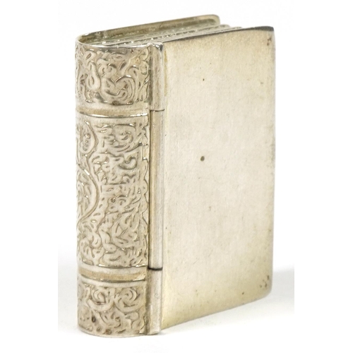 291 - Novelty silver vesta in the form of a book, 3.5cm in length, 14.6g