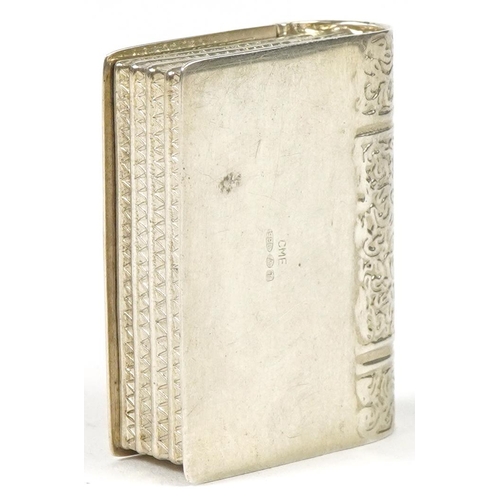 291 - Novelty silver vesta in the form of a book, 3.5cm in length, 14.6g