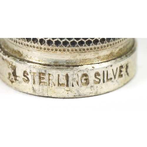 183 - Sewing interest German bier stein tape measure housing a Sterling silver thimble, 4.2cm high