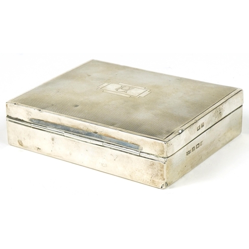 63 - Mappin & Webb, Elizabeth II engine turned silver cigarette box, Birmingham 1954, 3cm H x 11cm W x 9c... 