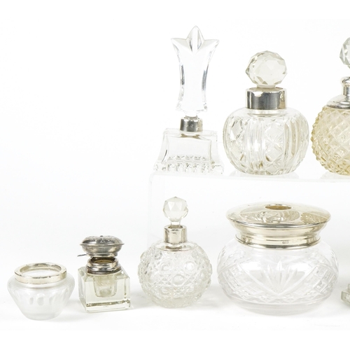 132 - Victorian and later silver mounted cut glass scent bottles, inkwells and jars, the largest 11.5cm hi... 