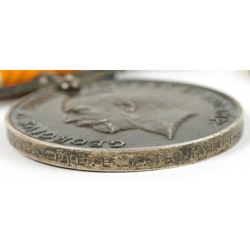 414 - British military World War I three medal group and a peace medallion, the medals comprising World Wa... 