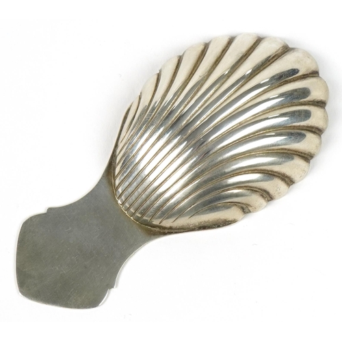 266 - Douglas Pell Silverware, Elizabeth II silver shell shaped caddy spoon, Birmingham 1989, 8cm in lengt... 