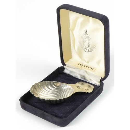 266 - Douglas Pell Silverware, Elizabeth II silver shell shaped caddy spoon, Birmingham 1989, 8cm in lengt... 