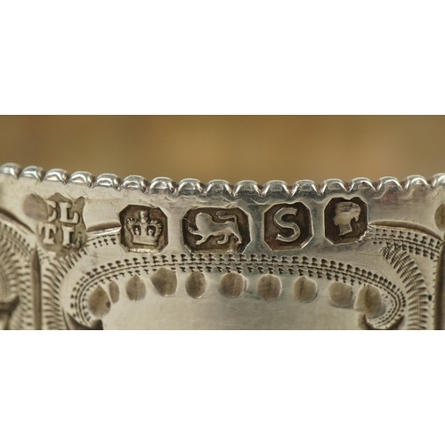 267 - Levesley Brothers, set of four Victorian engraved circular silver napkin rings housed in a velvet an... 