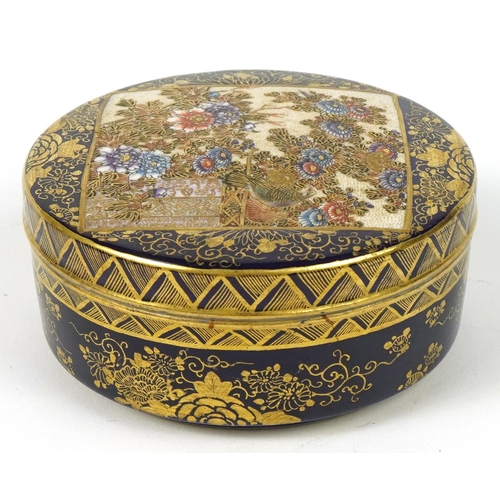 70 - Japanese Satsuma pottery blue ground box and cover hand painted with flowers, character marks to the... 