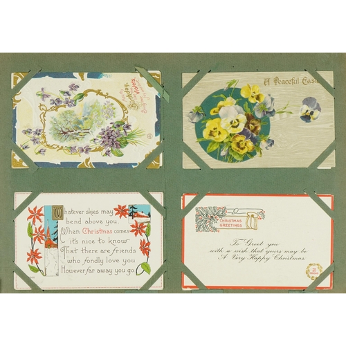 1444 - Collection of early 20th century and later greetings cards arranged in an album