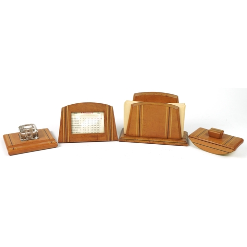 Art Deco tooled leather four piece desk set including inkwell, blotter and calendar, the largest 19.5cm wide