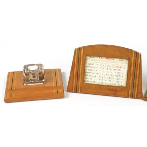 85 - Art Deco tooled leather four piece desk set including inkwell, blotter and calendar, the largest 19.... 