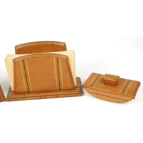 85 - Art Deco tooled leather four piece desk set including inkwell, blotter and calendar, the largest 19.... 