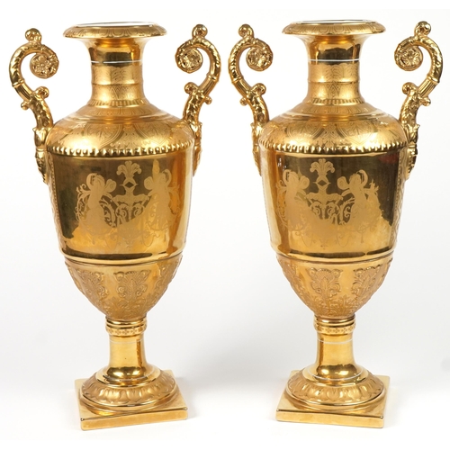 129A - Large pair of continental gilt porcelain vases each hand painted with panels of soldiers in military... 