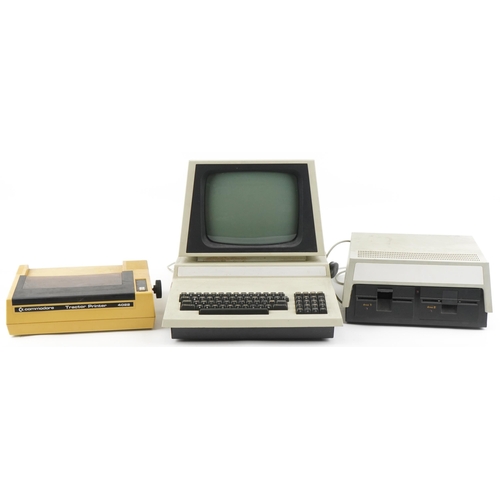 1392 - Vintage Commodore comprising 4016-N computer, 4022 tractor printer and dual floppy 4040