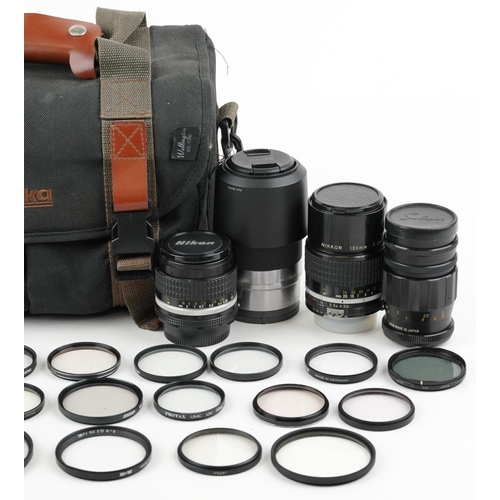 1331 - Camera lenses including Nikon 55mm F/2.8AIS, Nikon 28mm F/2.8AIS, Nikon 135mm F/2.8AIS and Sony 55-2... 