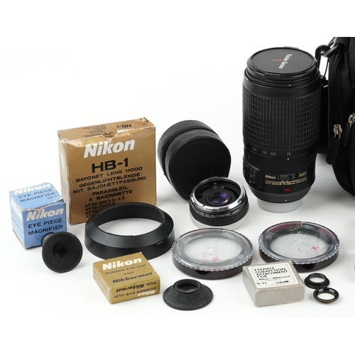 1329 - Camera lenses and accessories including Nikon 70-300 VR lens, metred head for Nikon F and DP-30 head... 