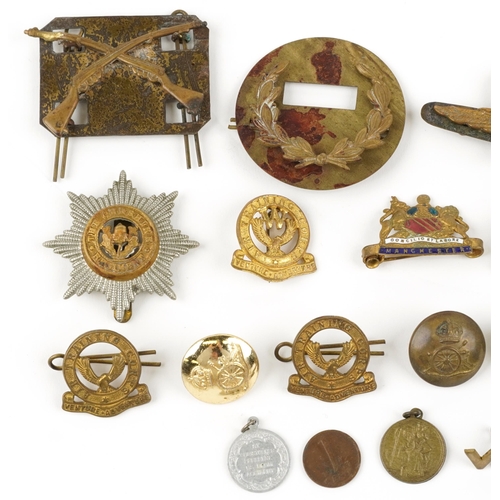 437 - Military interest cap badges and buttons including Manchester, The Cheshire Regiment and Air Trainin... 