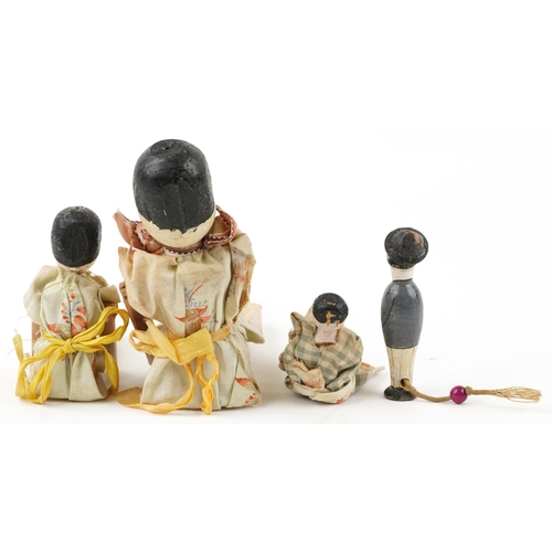 1370 - Four antique Queen Anne style peg dolls, the largest 26cm high