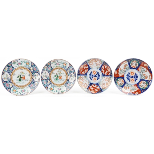 1204 - Four Japanese porcelain chargers including a pair hand painted with figures and panels of flowers, t... 