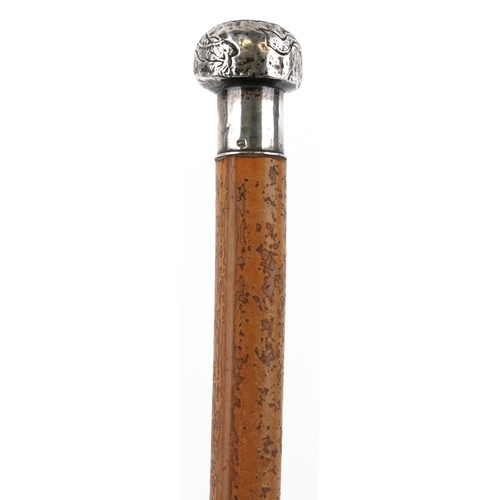 332 - Malacca walking stick with Chinese silver pommel engraved with dragons, 85cm in length