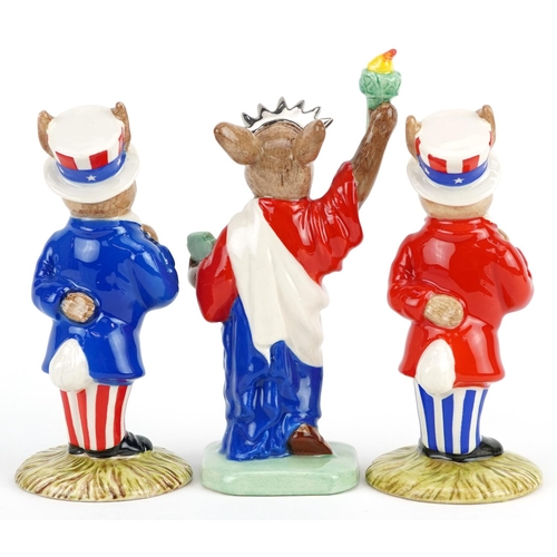 380A - Three Royal Doulton Bunnykins figures comprising two Uncle Sam Bunnykins and Statue of Liberty Bunny... 